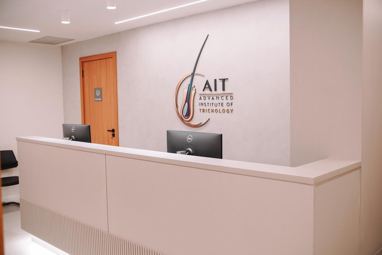 Recepção do AIT com logo do instituto